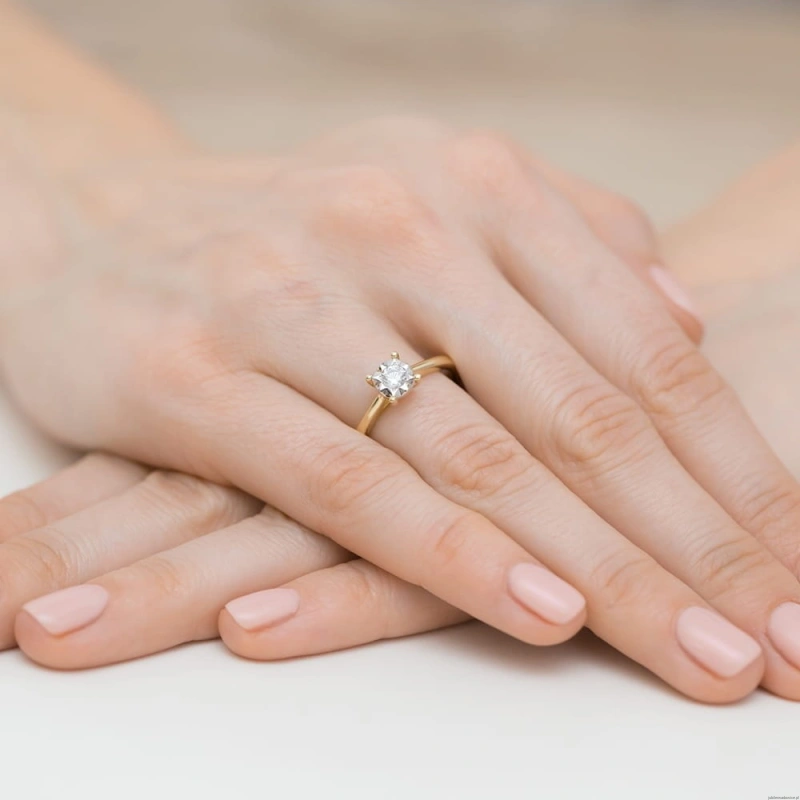 Pierścionek W447 Diament 0,20ct żółte złoto
