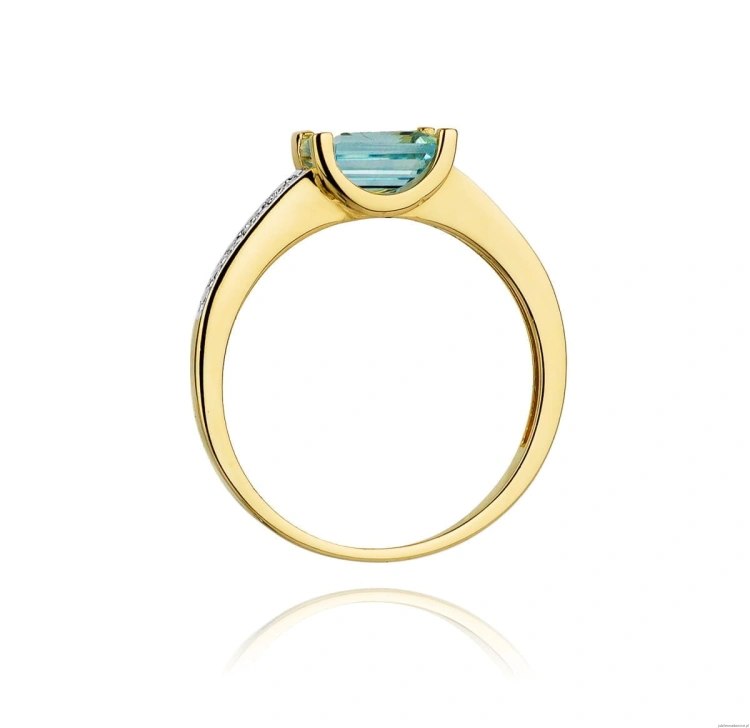 Pierścionek W105 Topaz 0,65ct żółte złoto