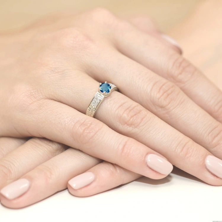 Pierścionek W075 Topaz London Blue 0,50ct białe złoto