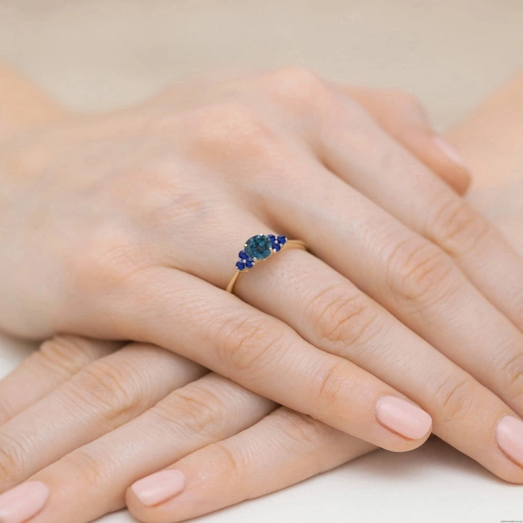 Pierścionek W451 Topaz London Blue 0,50ct żółte złoto
