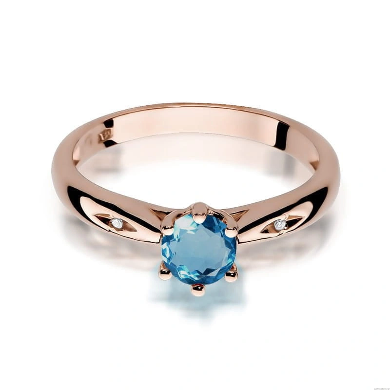 Pierścionek W074 Topaz London Blue 0,50ct różowe złoto