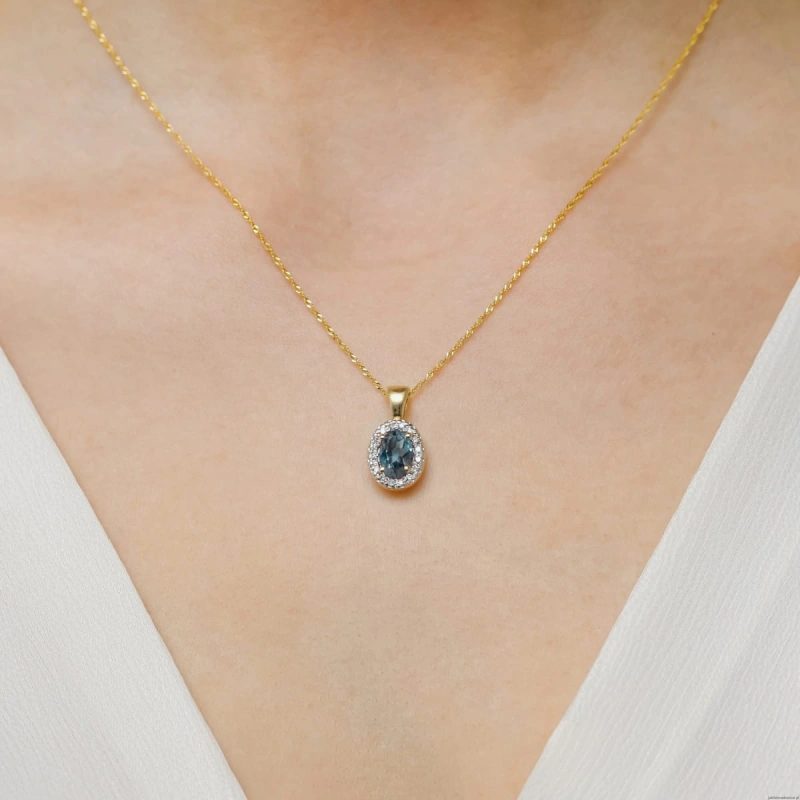 Zawieszka Z0574 Topaz London Blue 0,50ct żółte złoto