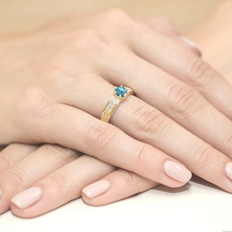 Pierścionek W0075 Topaz Swiss 0,50ct żółte złoto 375