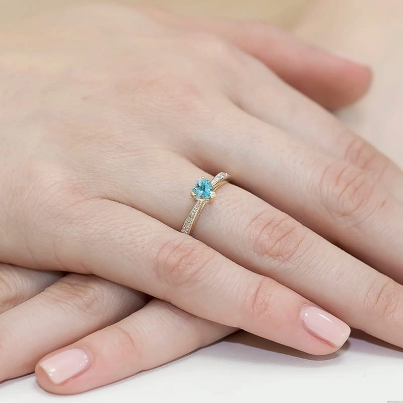 Pierścionek W0065 Topaz Swiss 0,50ct żółte złoto 375