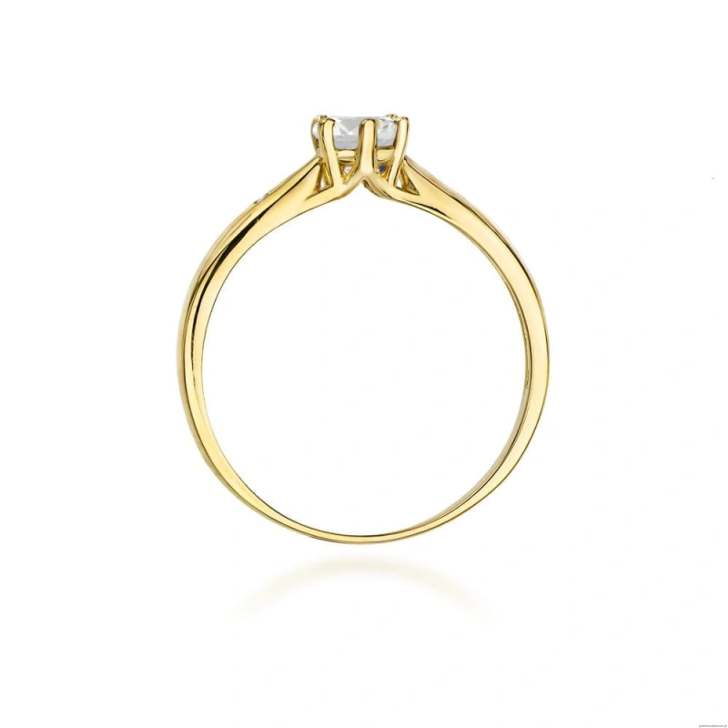 Pierścionek W0074 Biały Szafir 0,60ct żółte złoto 375